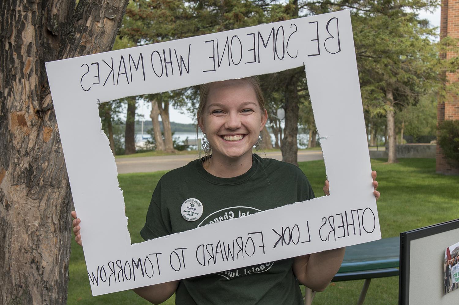 Student with banner